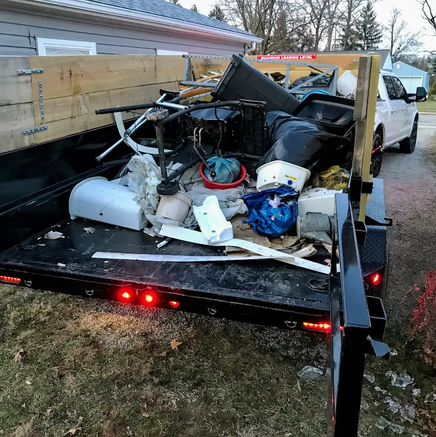 Roll-off dumpster delivered to a residential driveway in Waukee