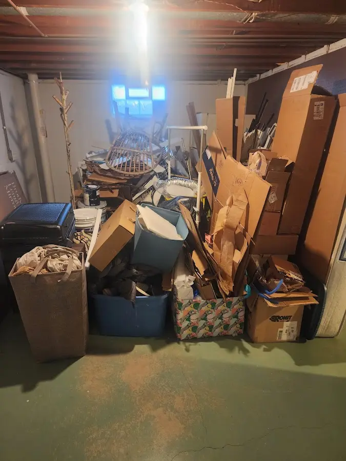 Roll-off dumpster container at job site for Yard Waste Dumpster Rental in Waukee